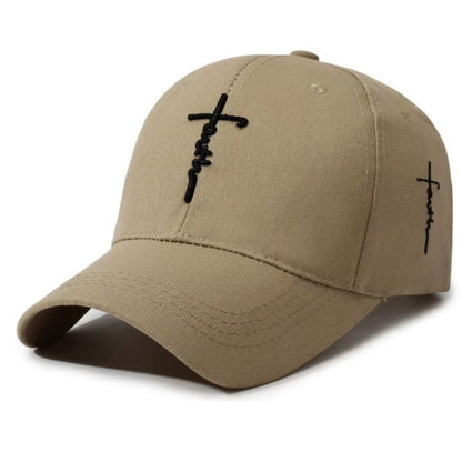 A khaki baseball cap with black embroidered crosses on the front and side, shown on a plain white background.