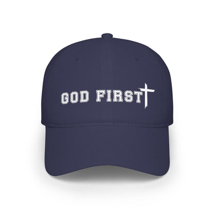 A black baseball cap with 'GOD FIRST' and a cross embroidered in white on the front, shown against a plain white background.