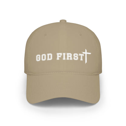 A khaki baseball cap with 'GOD FIRST' and a cross embroidered in white on the front, shown against a plain white background.