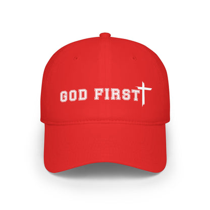 A red baseball cap with 'GOD FIRST' and a white cross embroidered on the front, shown against a plain white background.